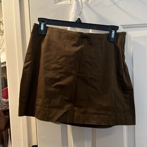 Express size 7/8 dark green short mini skirt. Fits like a small